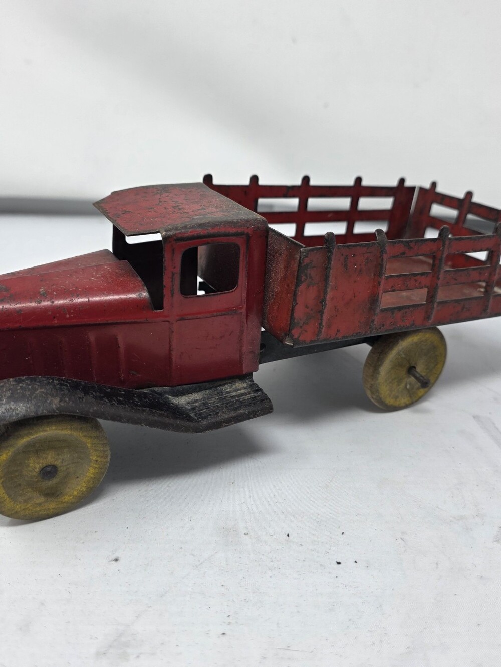 1930s Wyandotte Pressed Steel 10" Stake Bed Toy Truck – Red with Wood Wheels
